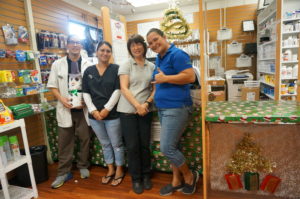 Pharmacare at Tamura Super Market From left to right: Dean Fujimoto, pharmacy manager; Kristan Alapai; Paula Ng; and Donna Munson Yukumoto, pharmacy manager.